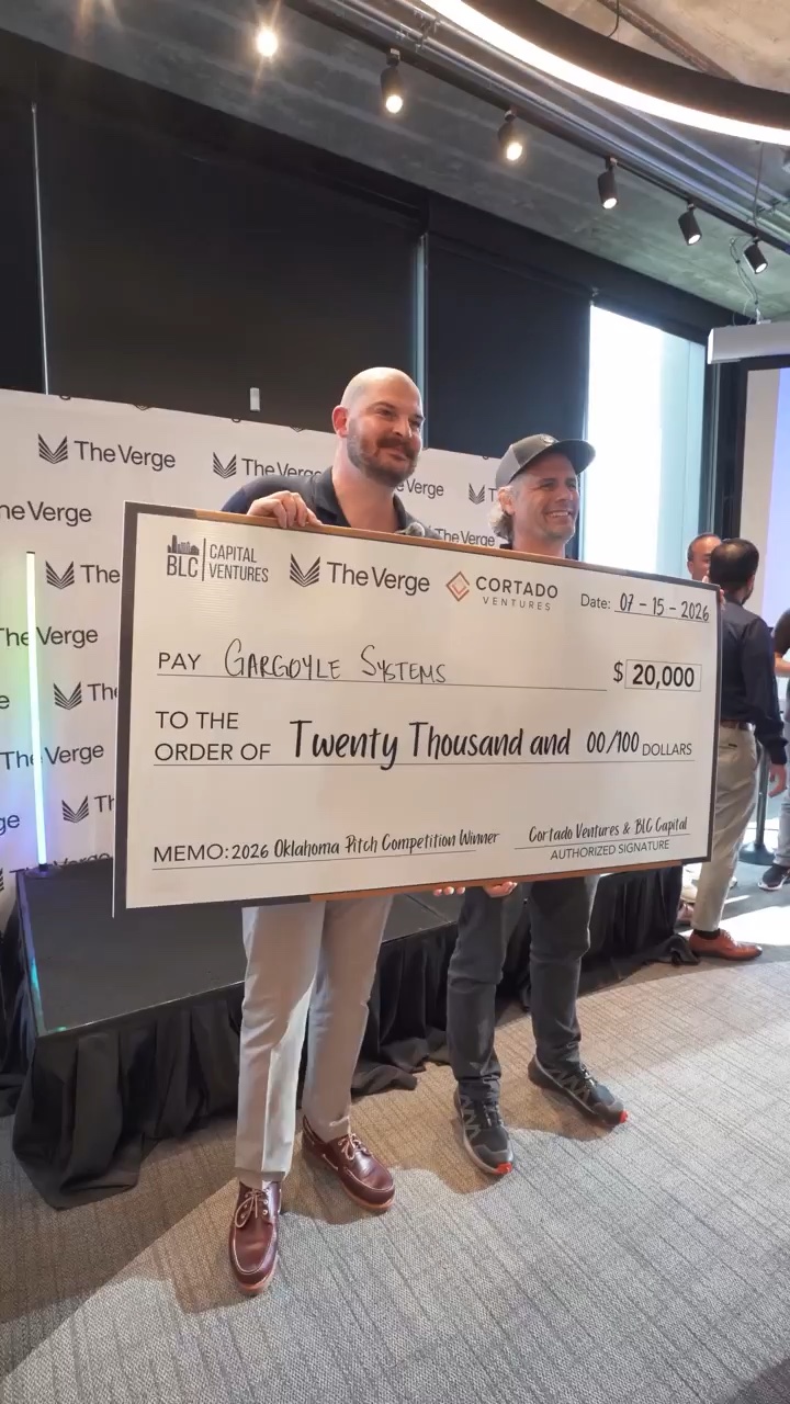 Gargoyle co-founders holding the winning check at The Verge OKC pitch competition
